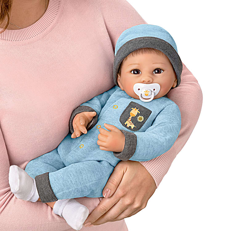 Baby doll breathes coos and has a heartbeat 2025