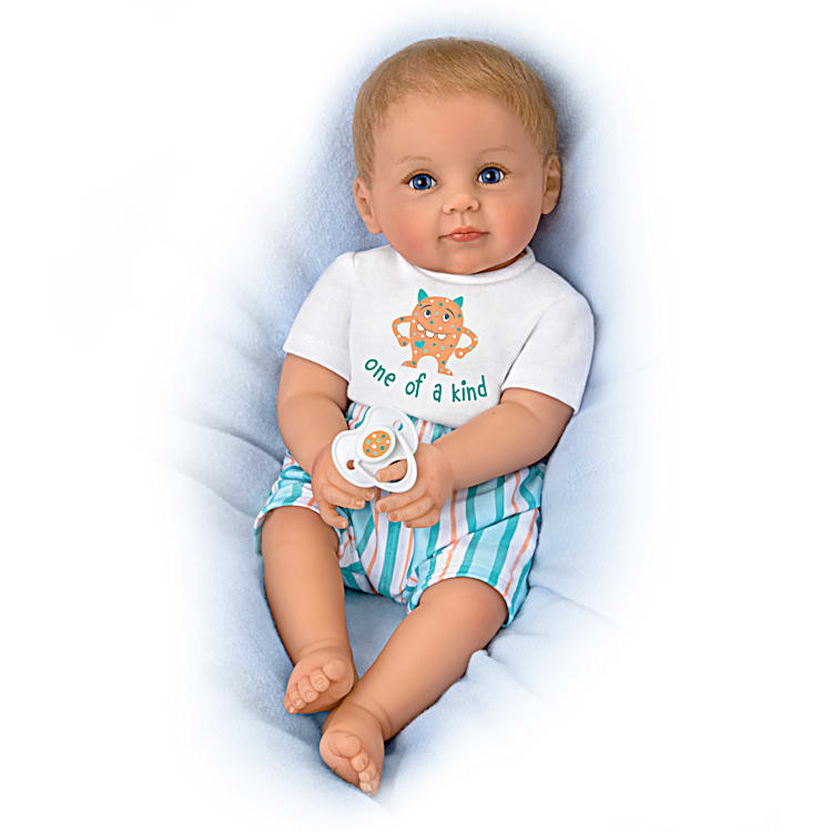 Soft doll with magnetic pacifier on sale