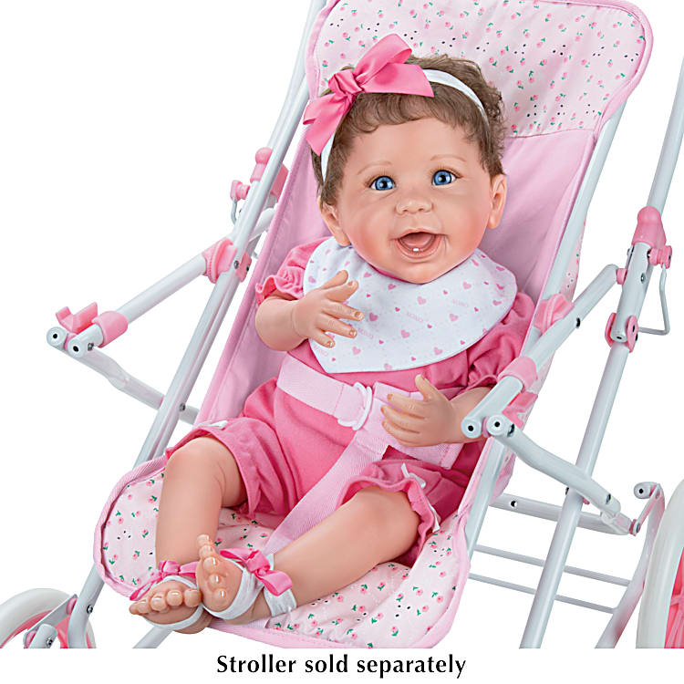 Hand Painted Realistic Baby Doll Featuring A Ruffled Pink Bubble Outfit With Matching Headband Bib