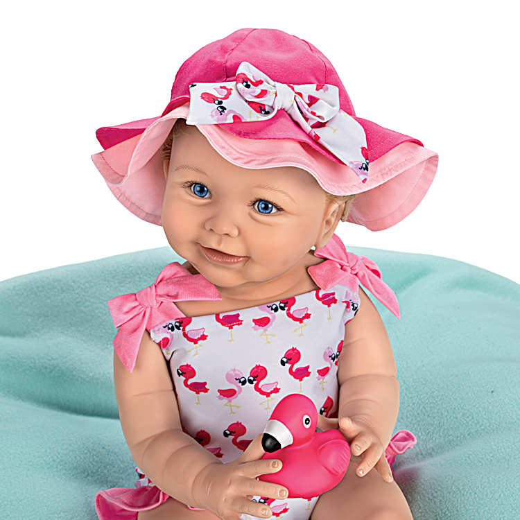 Hand-Painted Realistic Baby Doll Featuring A Flamingo Print