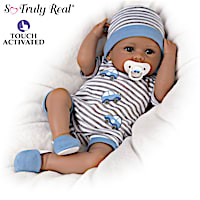 Touch-Activated Baby Doll "Coos" And Has A "Heartbeat"
